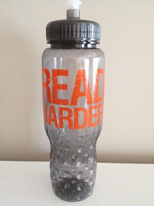 Plastic water bottle that says "READ HARDER"